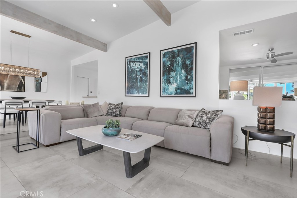 71620 Halgar Road Rancho Mirage, CA 92270 - Photo 6 of 41 a living room with furniture and a table