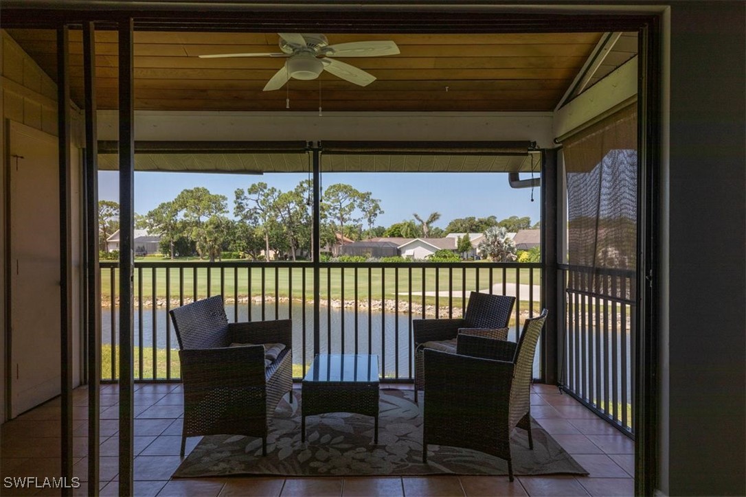 16620 Partridge Place Road, Unit 202 Fort Myers, FL 33908 - Photo 11 of 27 a view of a chair and table in the balcony