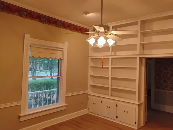 a view of a room with toys and a window