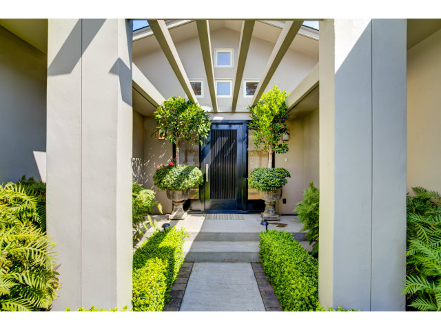 1021 Ocean Road Pebble Beach, CA 93953 - Photo 1 of 25 a view of a pathway with flower plants