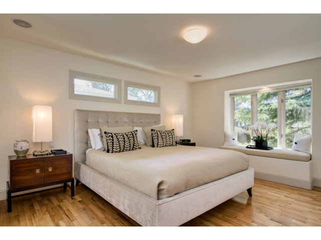 1021 Ocean Road Pebble Beach, CA 93953 - Photo 14 of 25 a bedroom with a bed and a large window