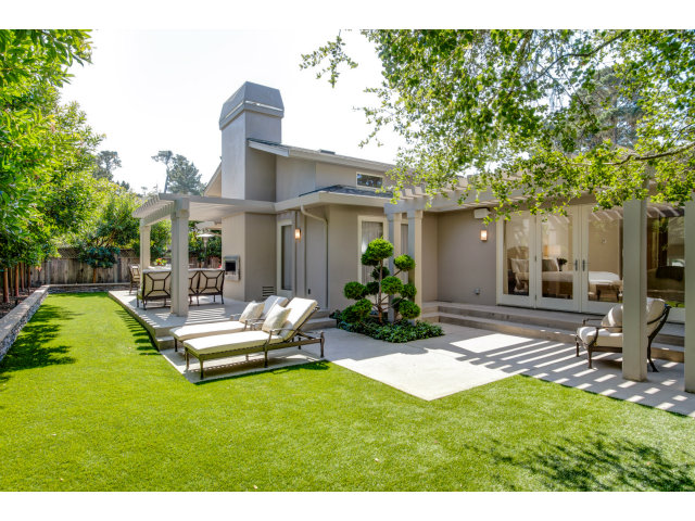 1021 Ocean Road Pebble Beach, CA 93953 - Photo 18 of 25 a view of a house with backyard porch and sitting area