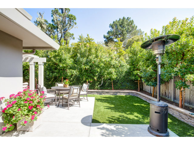 1021 Ocean Road Pebble Beach, CA 93953 - Photo 21 of 25 a garden view with a seating space