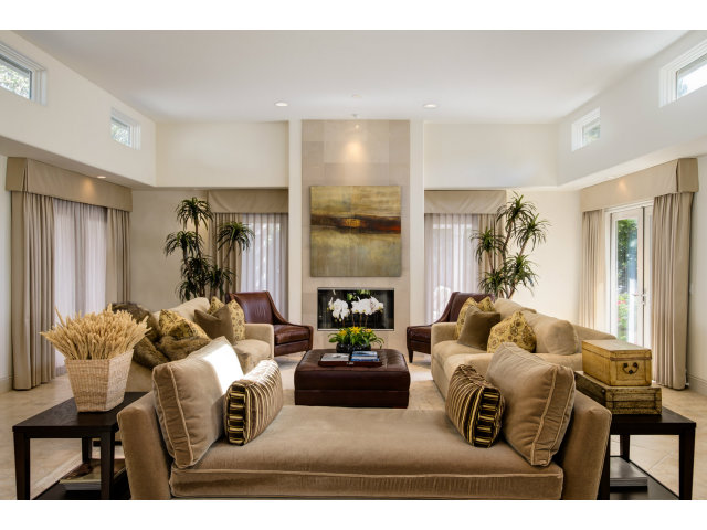 1021 Ocean Road Pebble Beach, CA 93953 - Photo 3 of 25 a living room with furniture and a fireplace