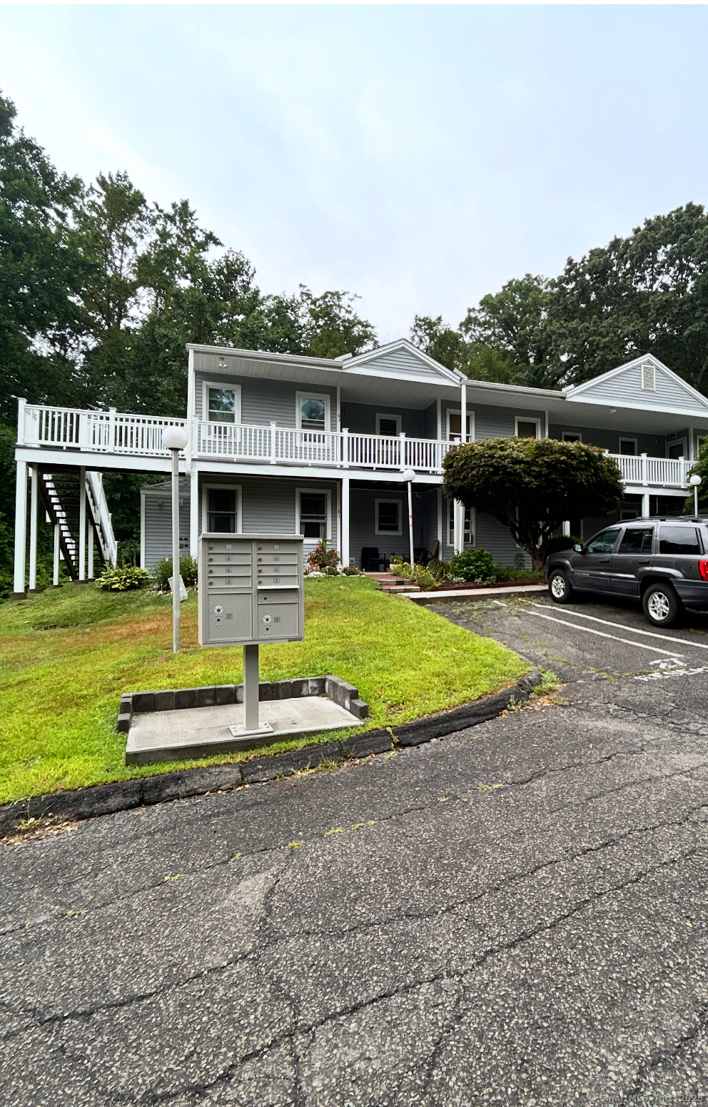 a view of swimming pool with outdoor seating and a yard