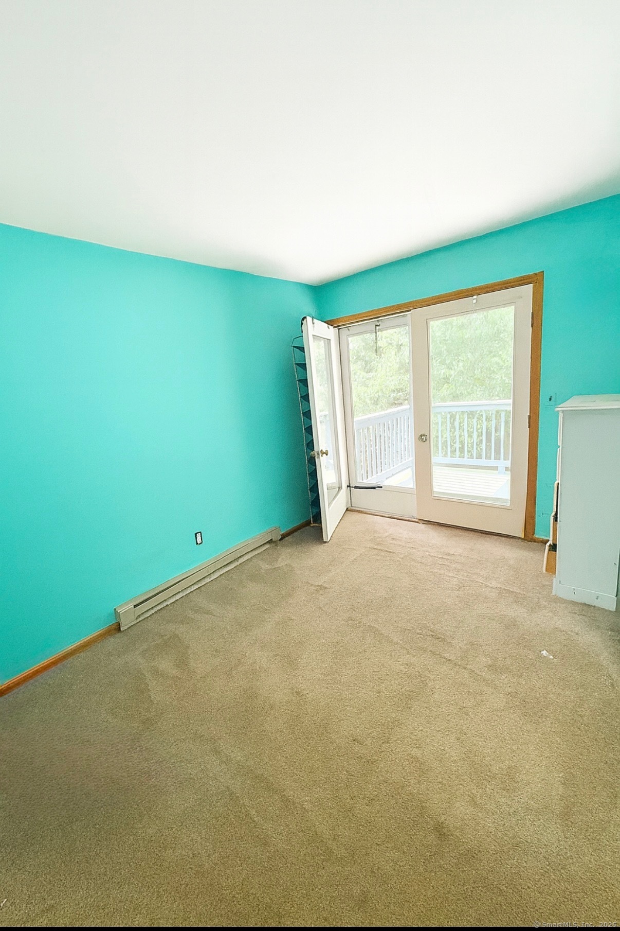 67 Hidden Knolls Circle, Unit 67 Monroe, CT 06468 - Photo 4 of 8 a view of an empty room with a window