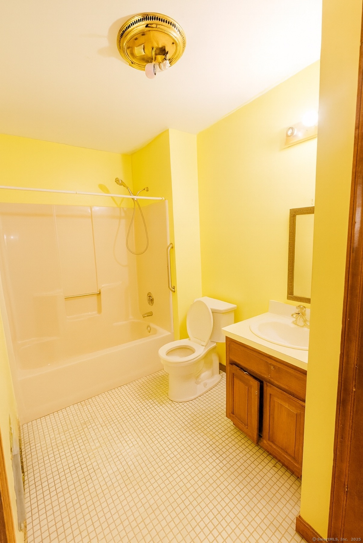 67 Hidden Knolls Circle, Unit 67 Monroe, CT 06468 - Photo 7 of 8 a bathroom with a sink a toilet and shower
