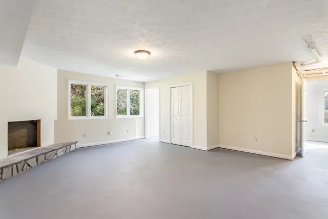 an empty room with windows