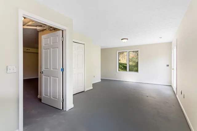 an empty room with windows