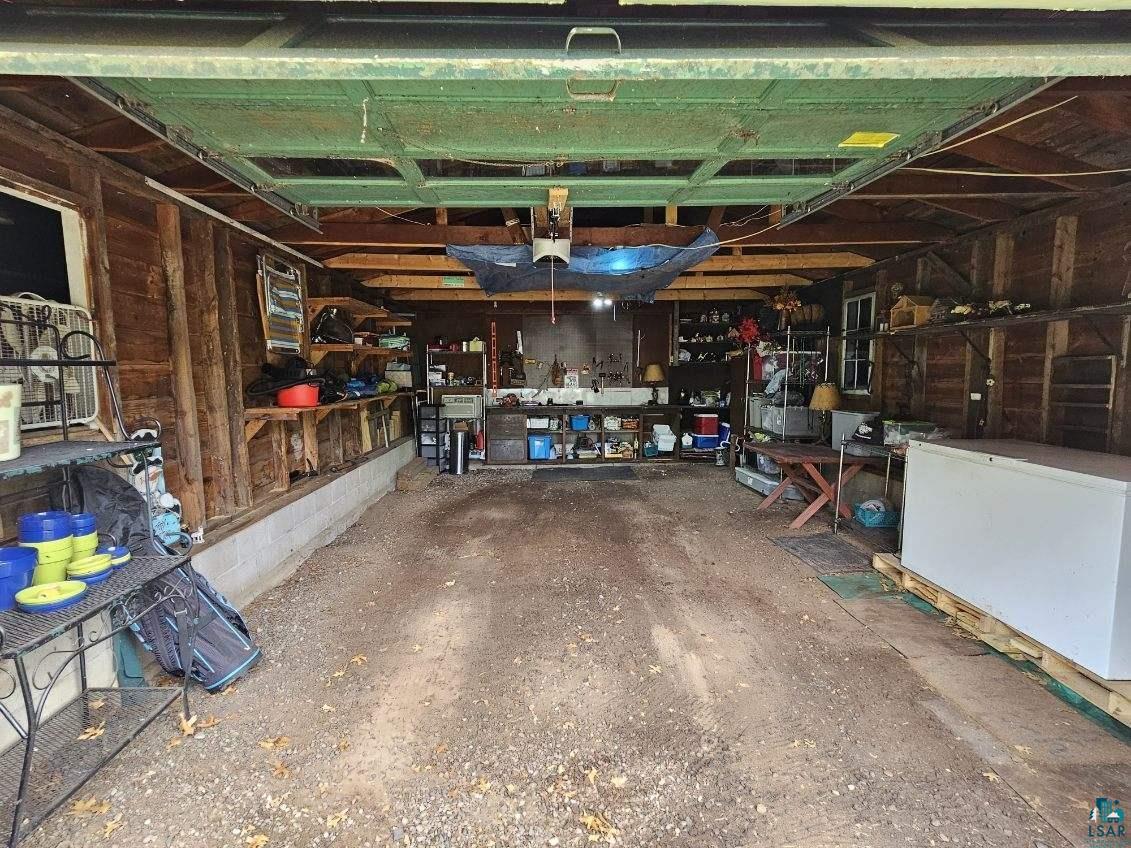N8348 Island Lake Road Spooner, WI 54801 - Photo 36 of 40 Garage featuring a workshop area