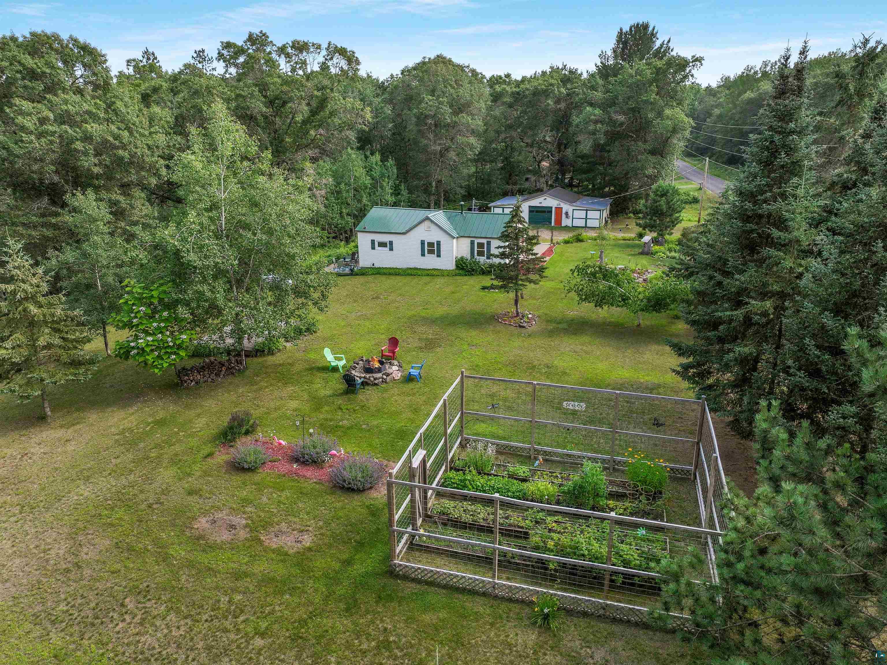 N8348 Island Lake Road Spooner, WI 54801 - Photo 39 of 40 Drone / aerial view featuring a rural view
