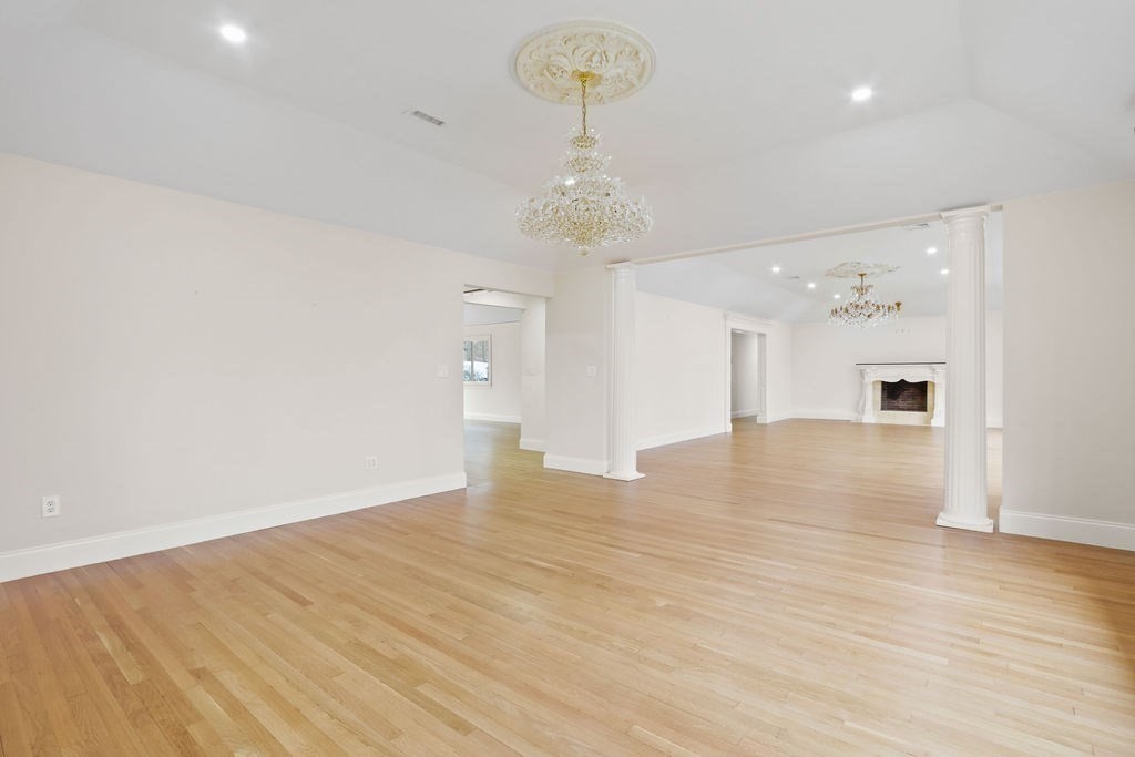 80 Doublet Hill Road Weston, MA 02493 - Photo 10 of 38 wooden floor in an empty room with a window