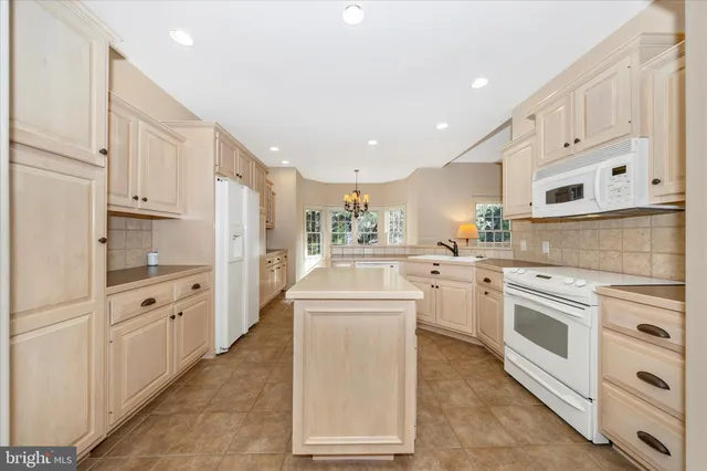 a bathroom with a sink a vanity and a mirror