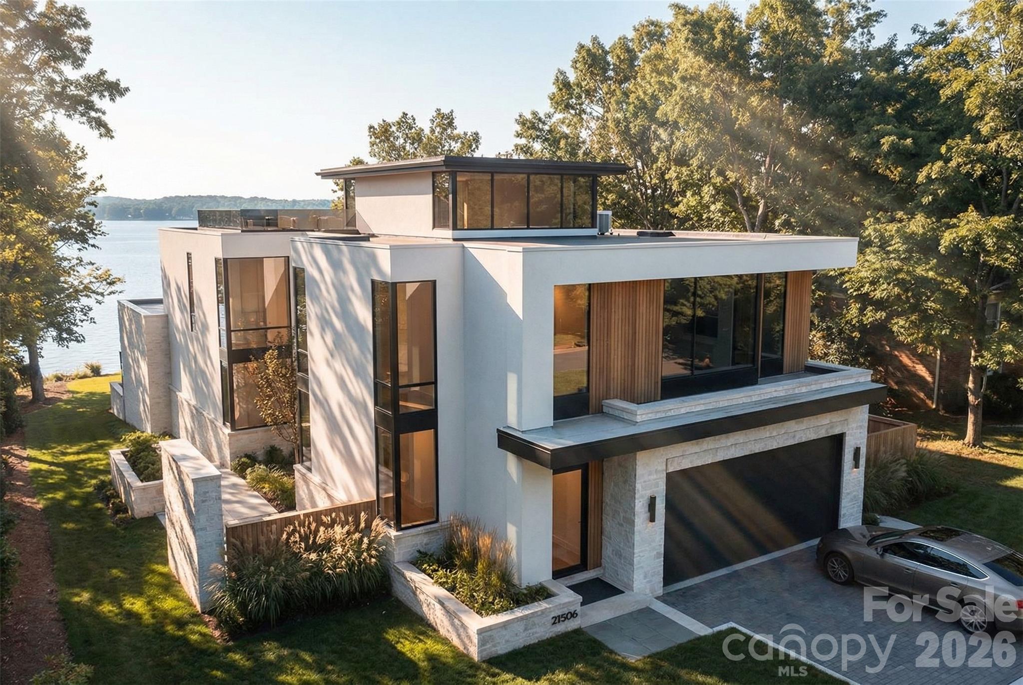 21506 Rio Oro Drive Cornelius, NC 28031 - Photo 2 of 3 a front view of a house with balcony