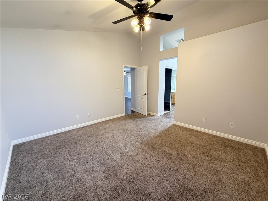 2185 Polynesia Circle Henderson, NV 89074 - Photo 30 of 37 Lofty ceilings and comfortable carpeting define this versatile interior space.