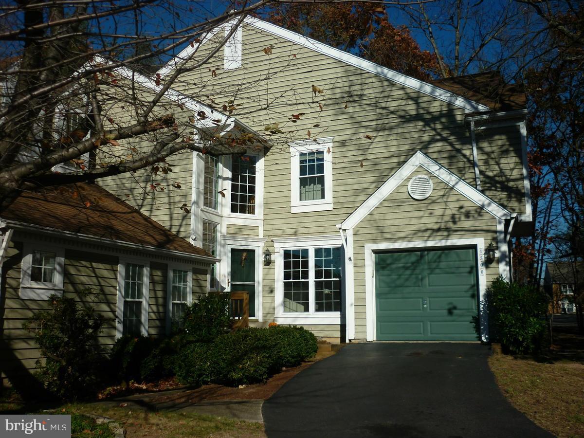 1500 Deer Point Way Reston, VA 20194 - Photo 2 of 26 a front view of a house with a garden