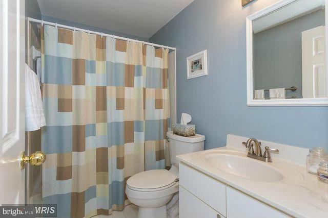 1500 Deer Point Way Reston, VA 20194 - Photo 19 of 26 a bathroom with a sink toilet and shower