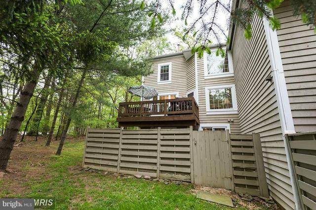 1500 Deer Point Way Reston, VA 20194 - Photo 26 of 26 a front view of a house with a garden
