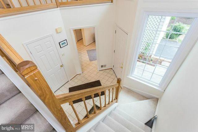 1500 Deer Point Way Reston, VA 20194 - Photo 8 of 26 a view of an entryway with wooden floor