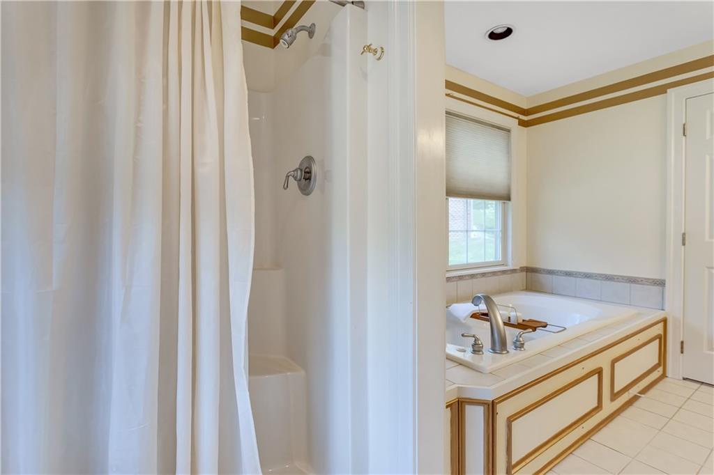 452 Sharon Road Coraopolis, PA 15108 - Photo 12 of 23 The master bath also includes a walk-in shower.