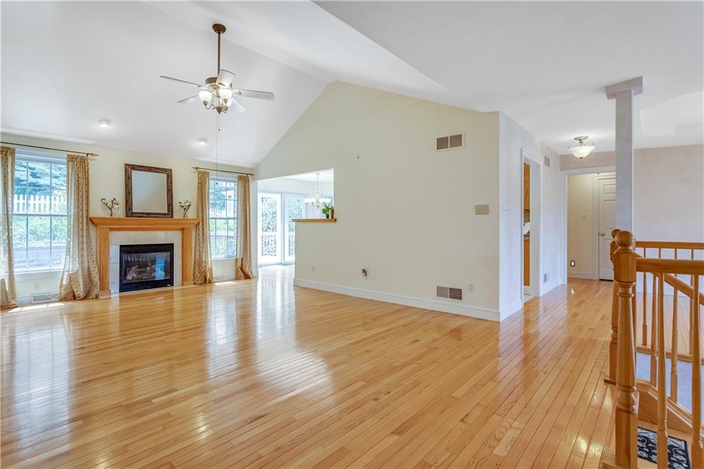 452 Sharon Road Coraopolis, PA 15108 - Photo 3 of 23 The grand living room includes hardwood floors and a center gas fireplace.