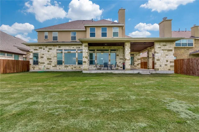 a view of a house with many windows
