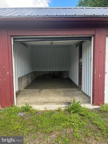 a view of wooden door and outdoor space