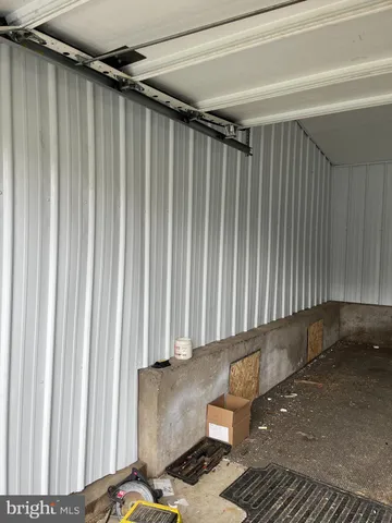 a view of a back yard with a chair