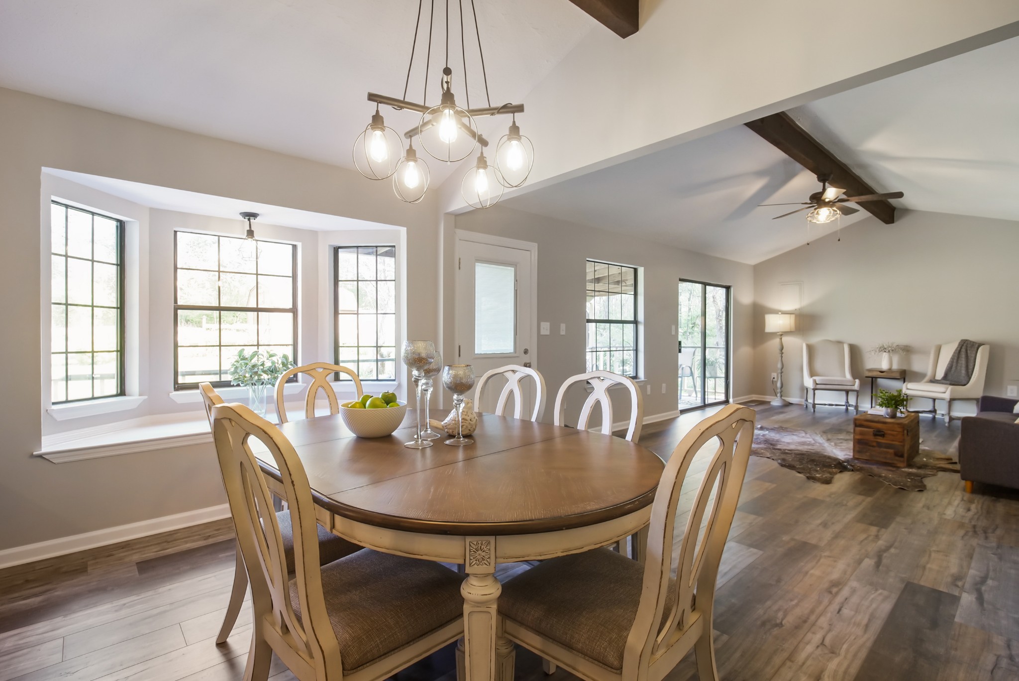 3977 Cairo Bend Road Lebanon, TN 37087 - Photo 16 of 39 a view of a dining room with furniture window and wooden floor