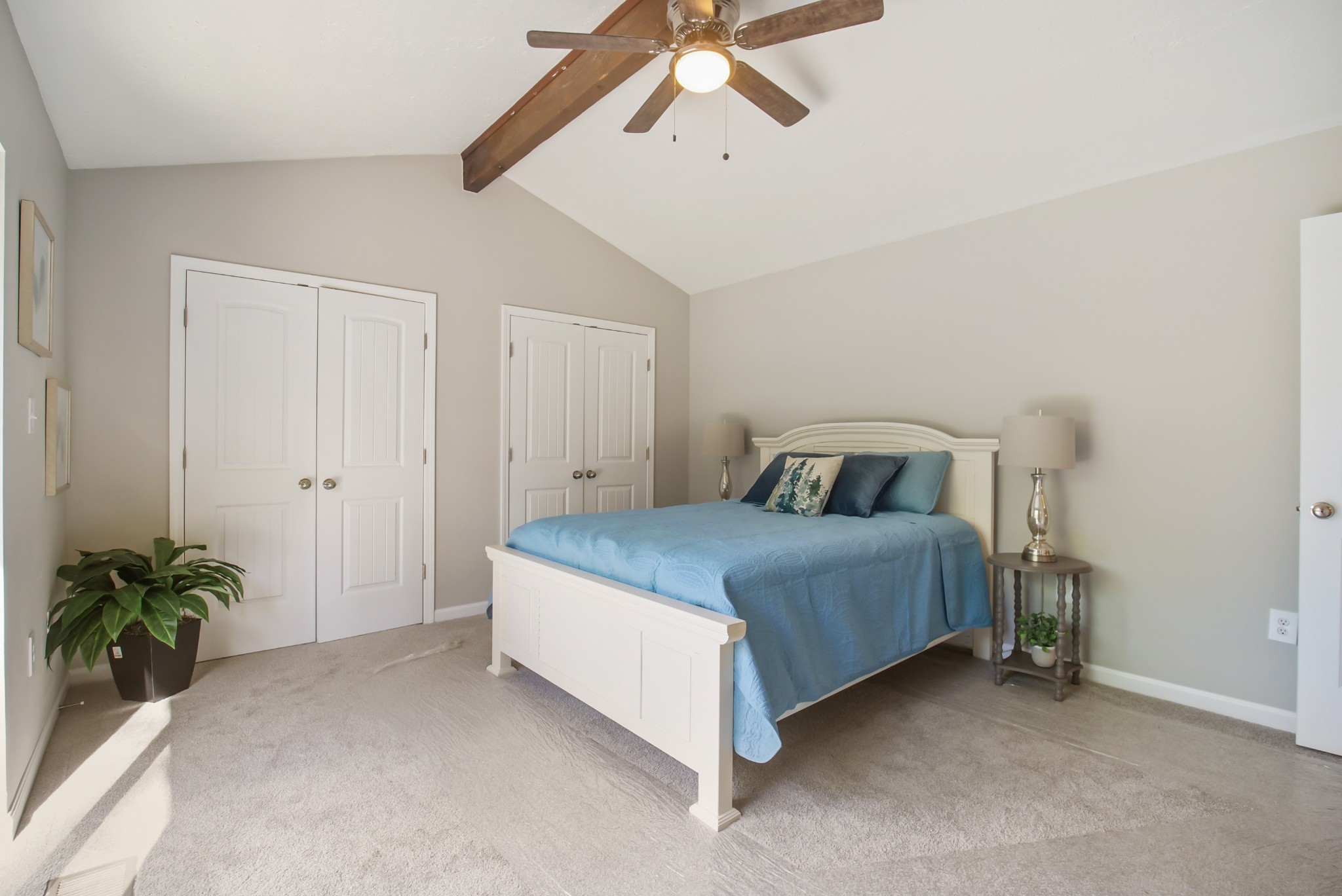 3977 Cairo Bend Road Lebanon, TN 37087 - Photo 23 of 39 a bedroom with a bed and a potted plant