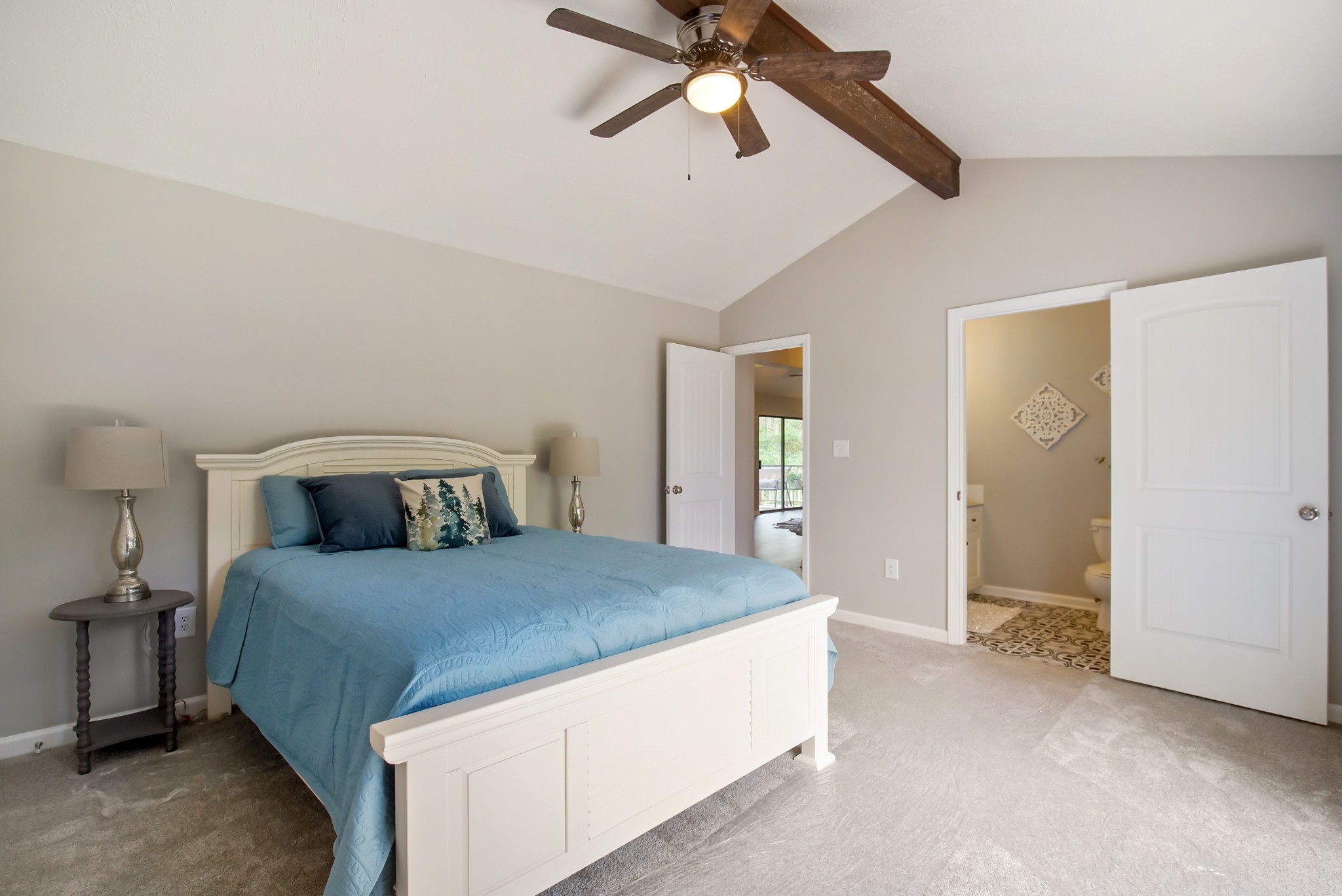 3977 Cairo Bend Road Lebanon, TN 37087 - Photo 24 of 39 a bedroom with a bed and a chandelier