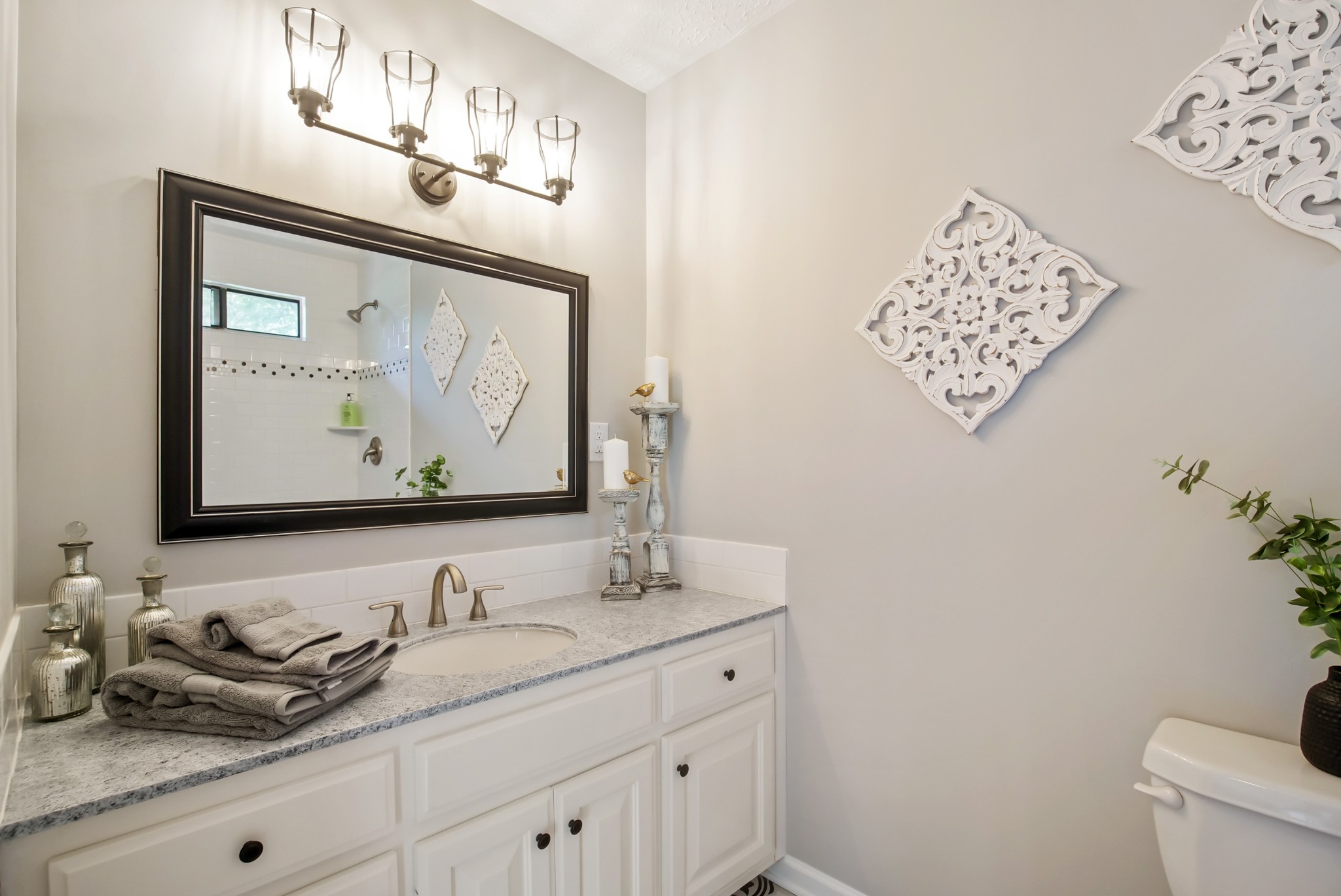 3977 Cairo Bend Road Lebanon, TN 37087 - Photo 25 of 39 a bathroom with a granite countertop sink and a mirror