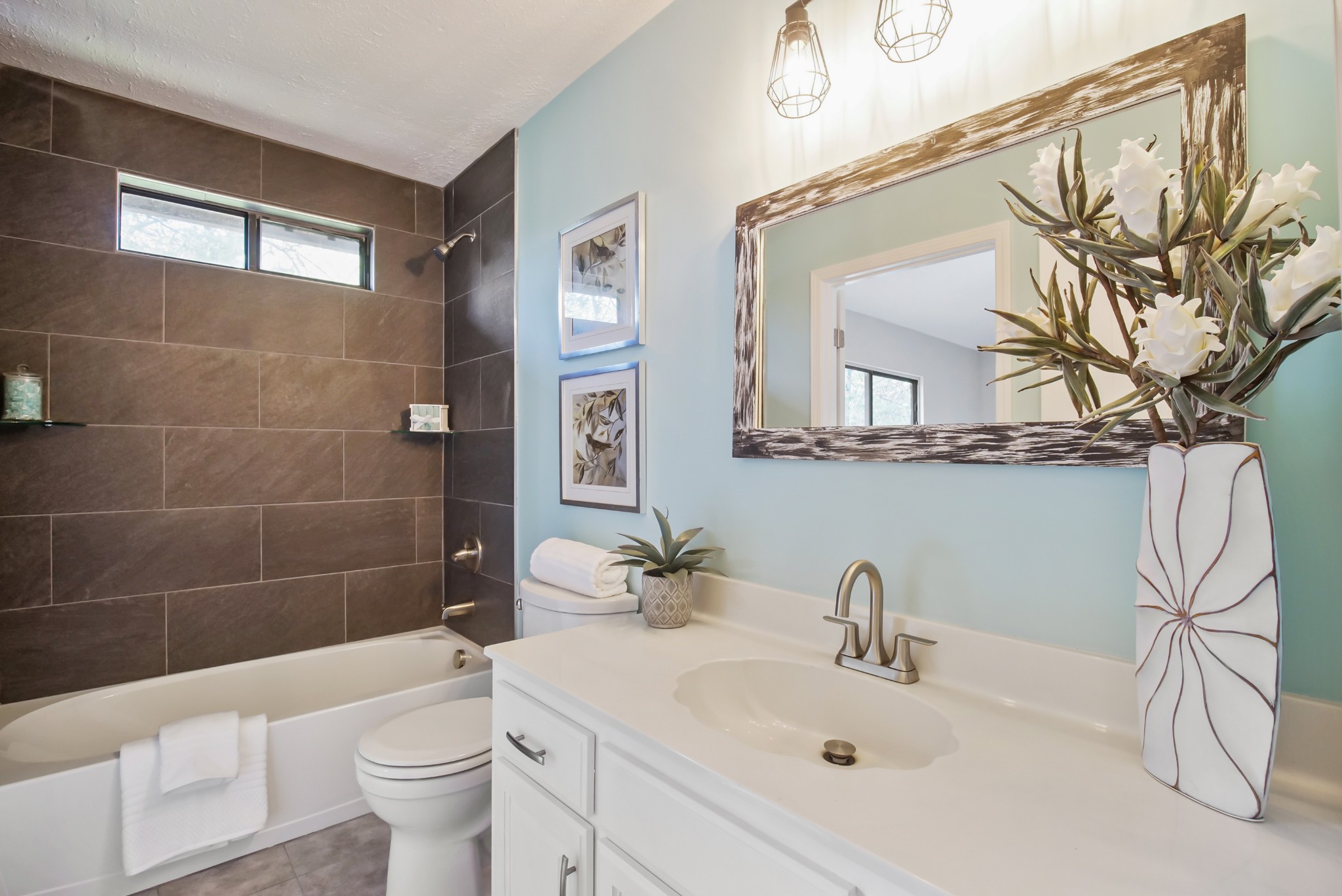 3977 Cairo Bend Road Lebanon, TN 37087 - Photo 29 of 39 a bathroom with a sink a toilet and shower