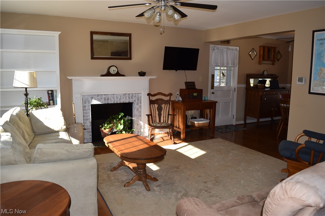65578 Mathews Road Cambridge, OH 43725 - Photo 3 of 40 Living room with dark hardwood / wood-style flooring and ceiling fan