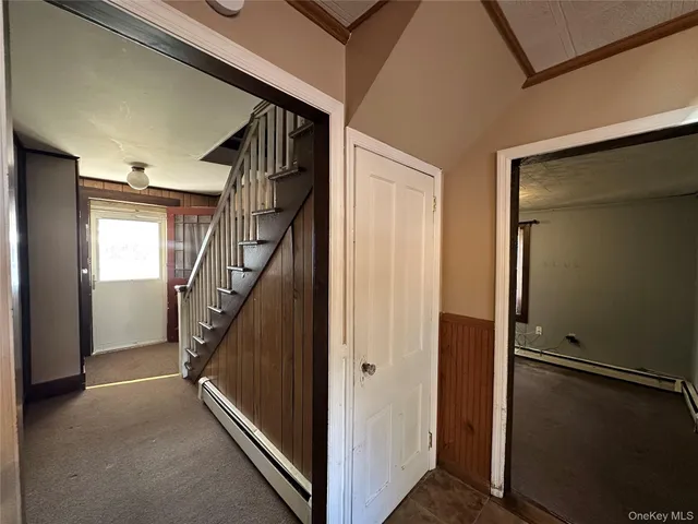 a view of hallway with stairs