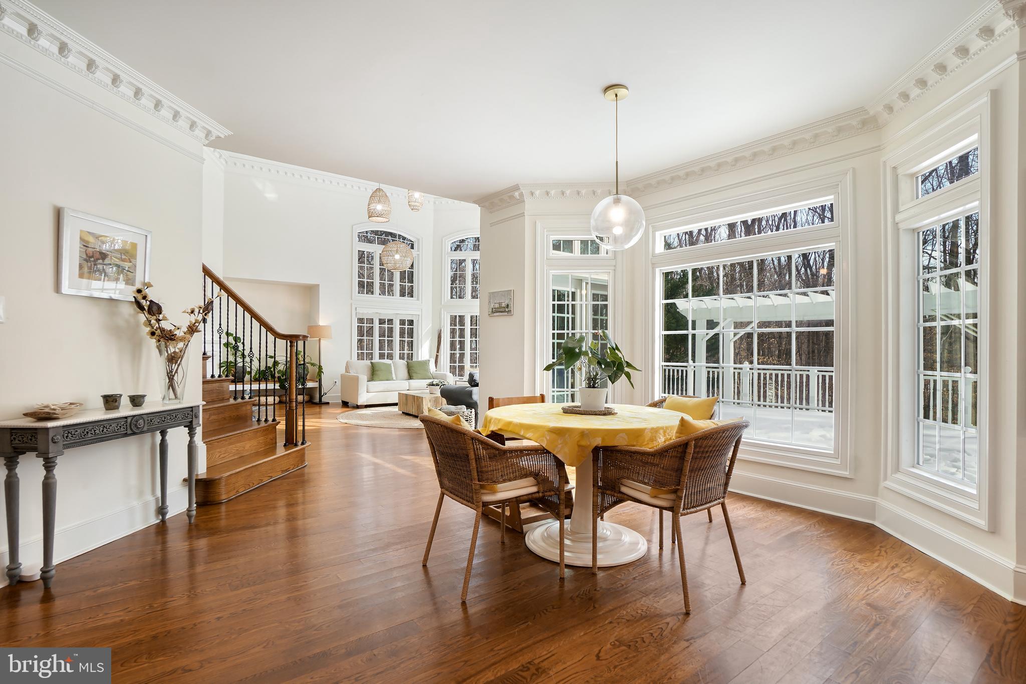 9646 Eagle Ridge Drive Bethesda, MD 20817 - Photo 17 of 75 a view of a dining room with furniture window and wooden floor