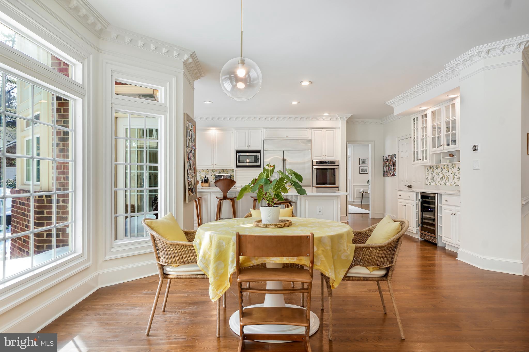 9646 Eagle Ridge Drive Bethesda, MD 20817 - Photo 18 of 75 a view of a dining room with furniture and wooden floor
