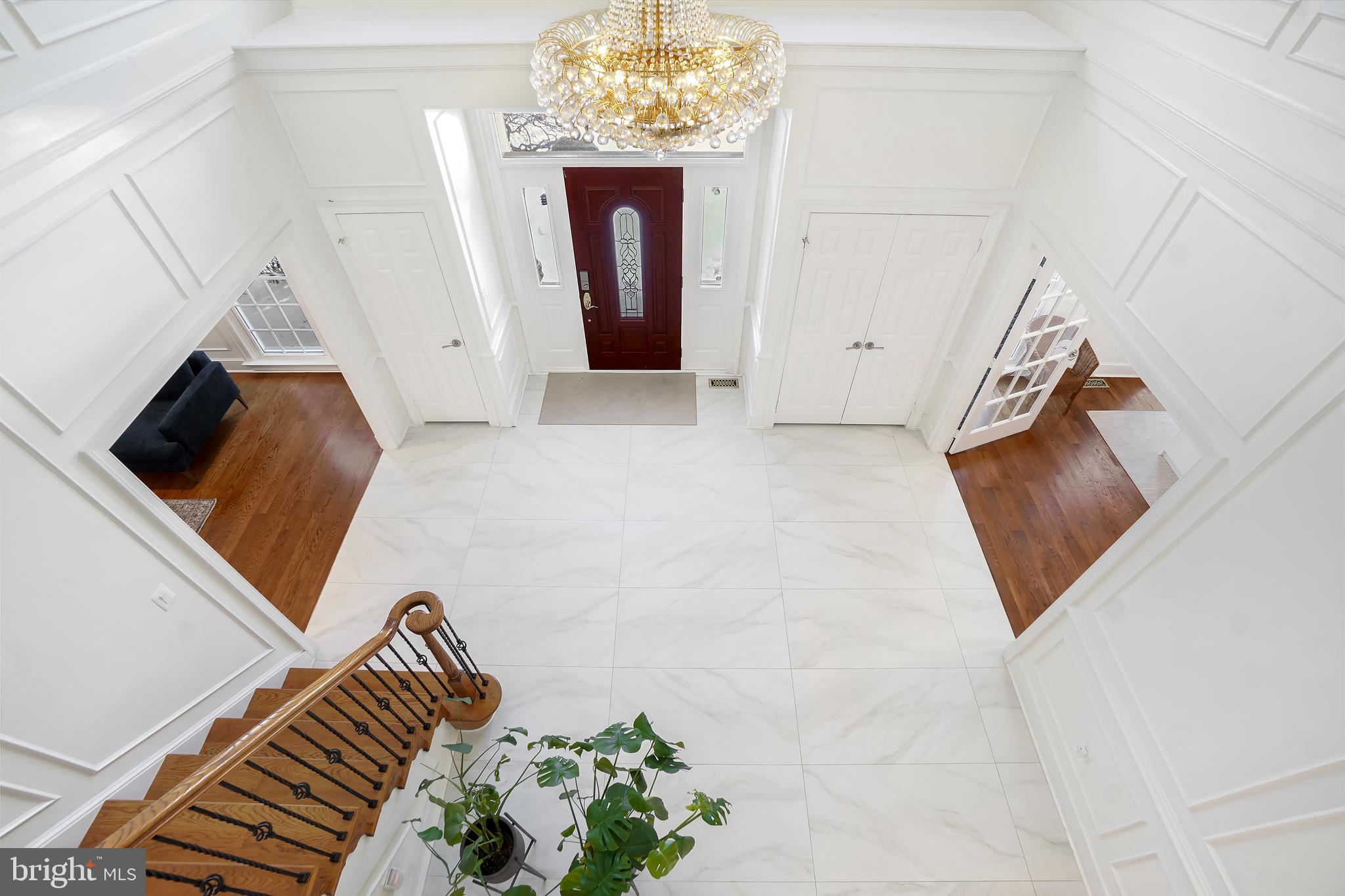 9646 Eagle Ridge Drive Bethesda, MD 20817 - Photo 22 of 75 a view of a living room with furniture and a chandelier