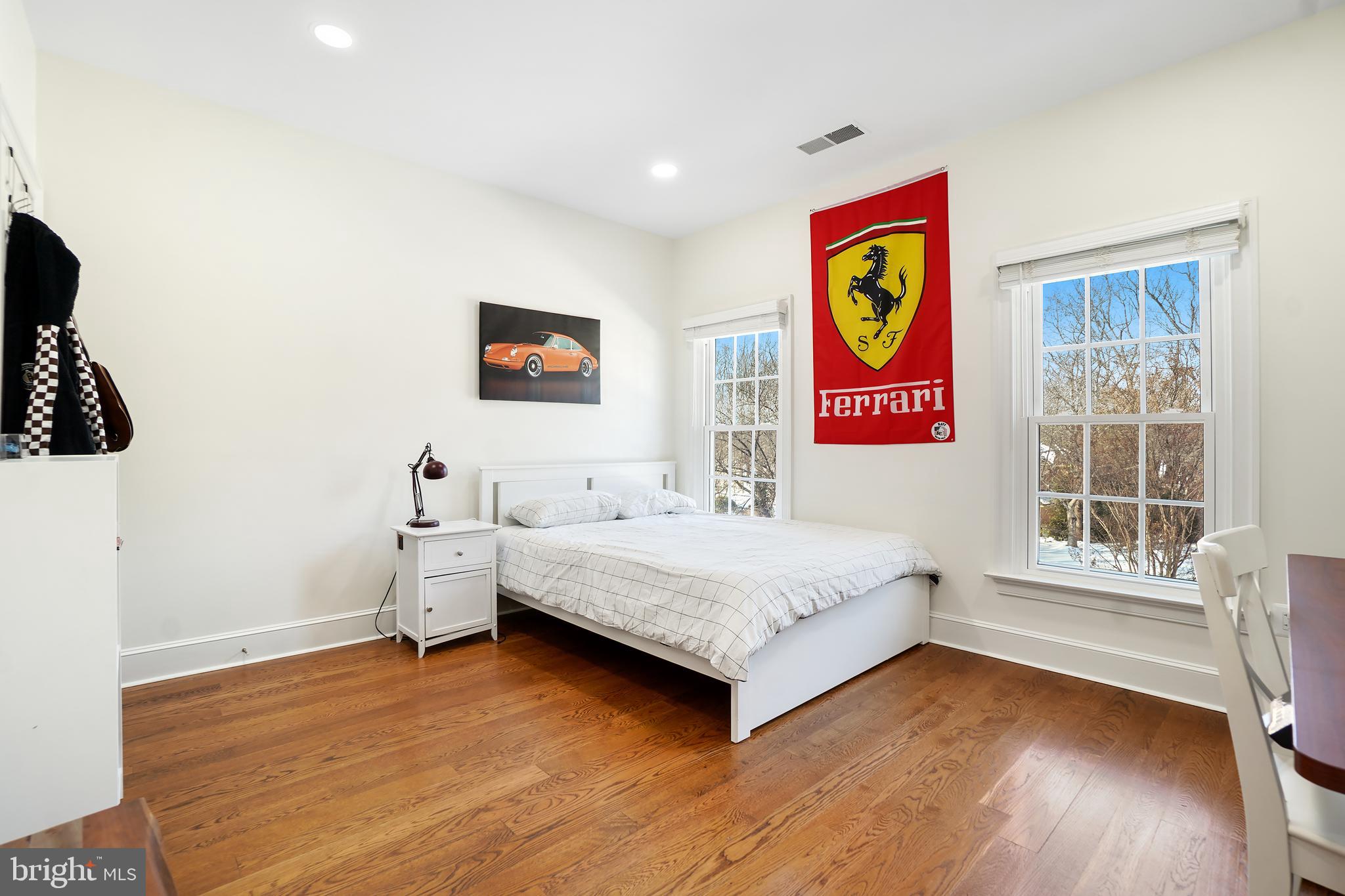 9646 Eagle Ridge Drive Bethesda, MD 20817 - Photo 24 of 75 a spacious bedroom with a bed and a window