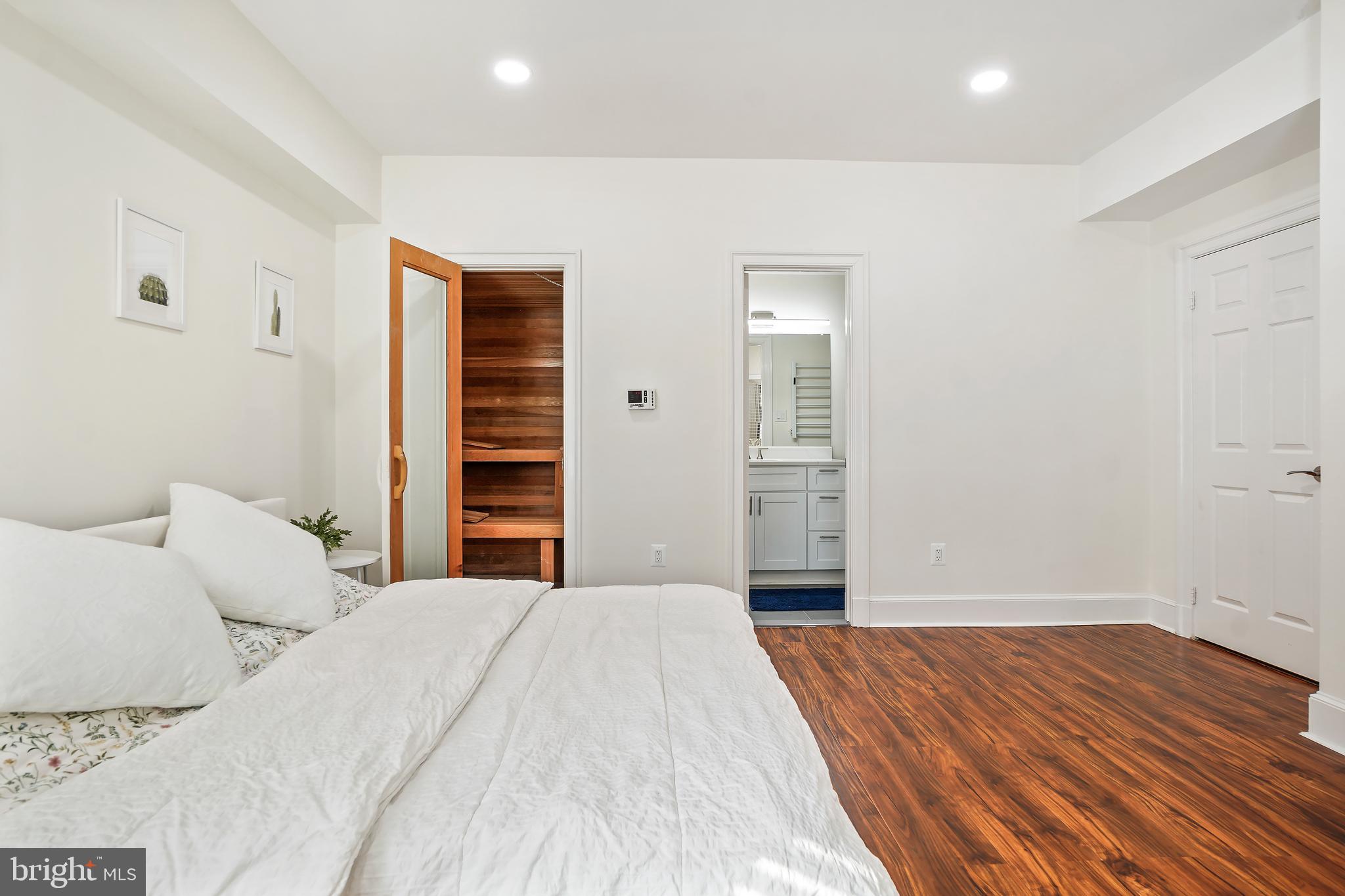 9646 Eagle Ridge Drive Bethesda, MD 20817 - Photo 45 of 75 a bedroom with a bed and a window