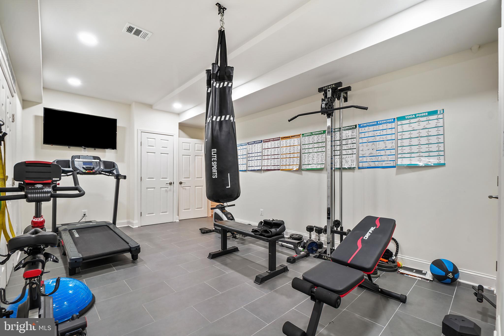 9646 Eagle Ridge Drive Bethesda, MD 20817 - Photo 47 of 75 a view of a room with gym equipment