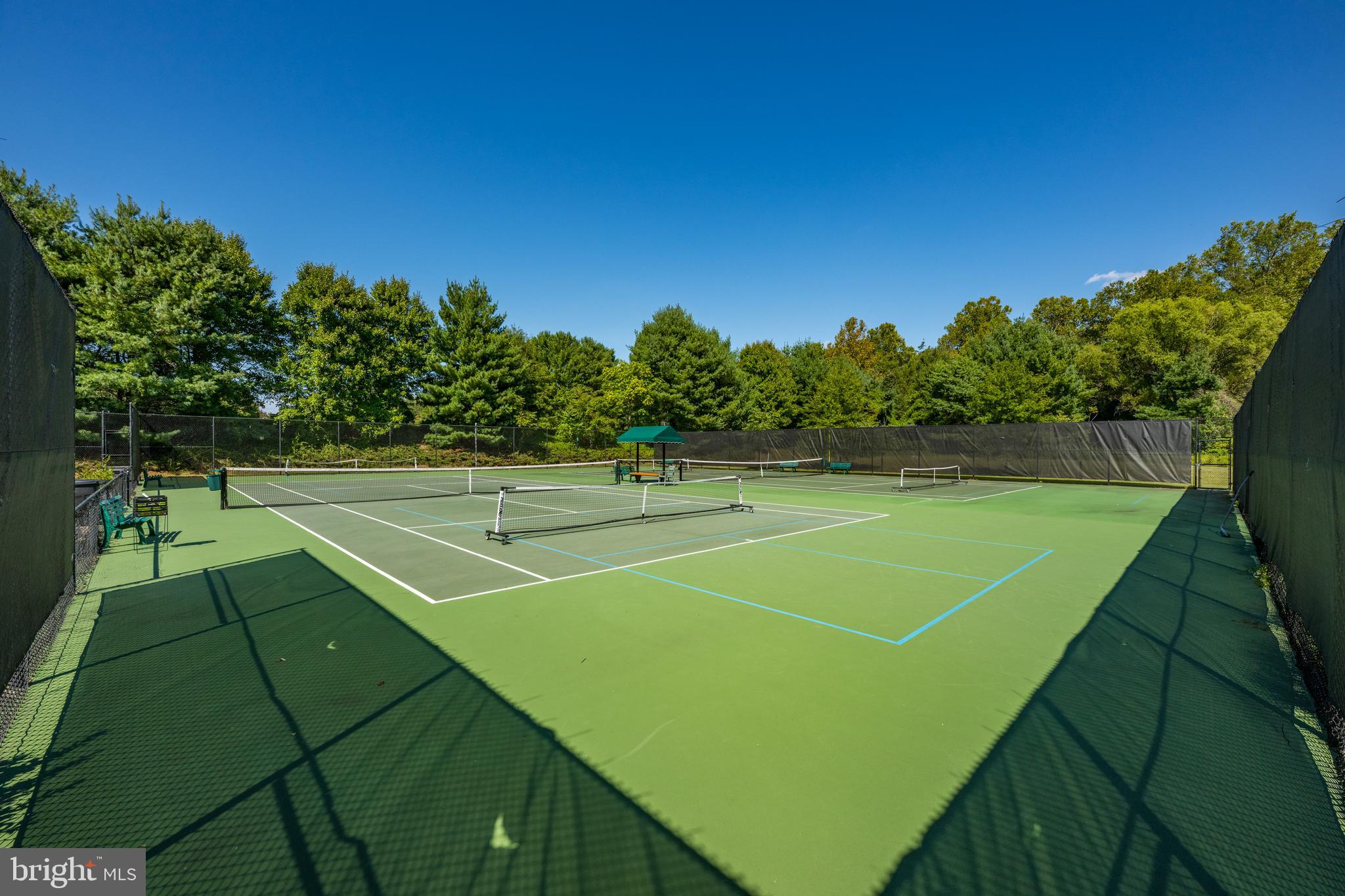 9646 Eagle Ridge Drive Bethesda, MD 20817 - Photo 60 of 75 a view of a tennis court