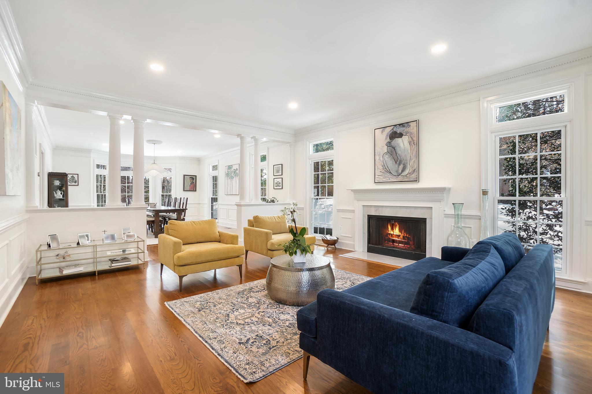 9646 Eagle Ridge Drive Bethesda, MD 20817 - Photo 8 of 75 a living room with furniture fireplace and a table
