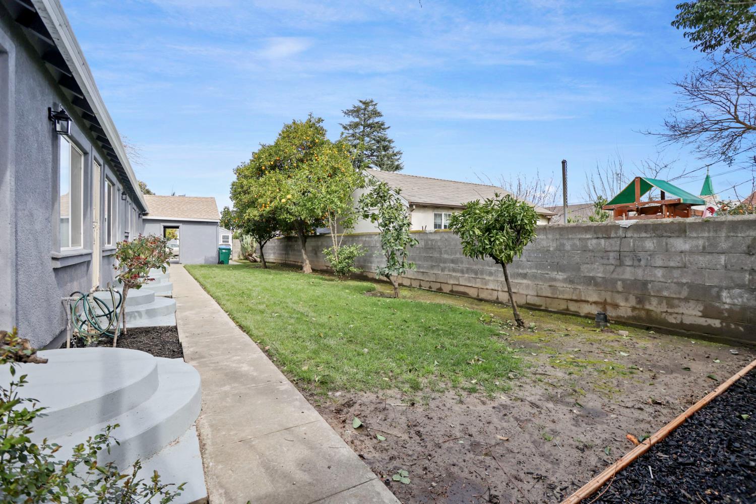 312 Cherry Street Lodi, CA 95240 - Photo 3 of 10 a view of a backyard
