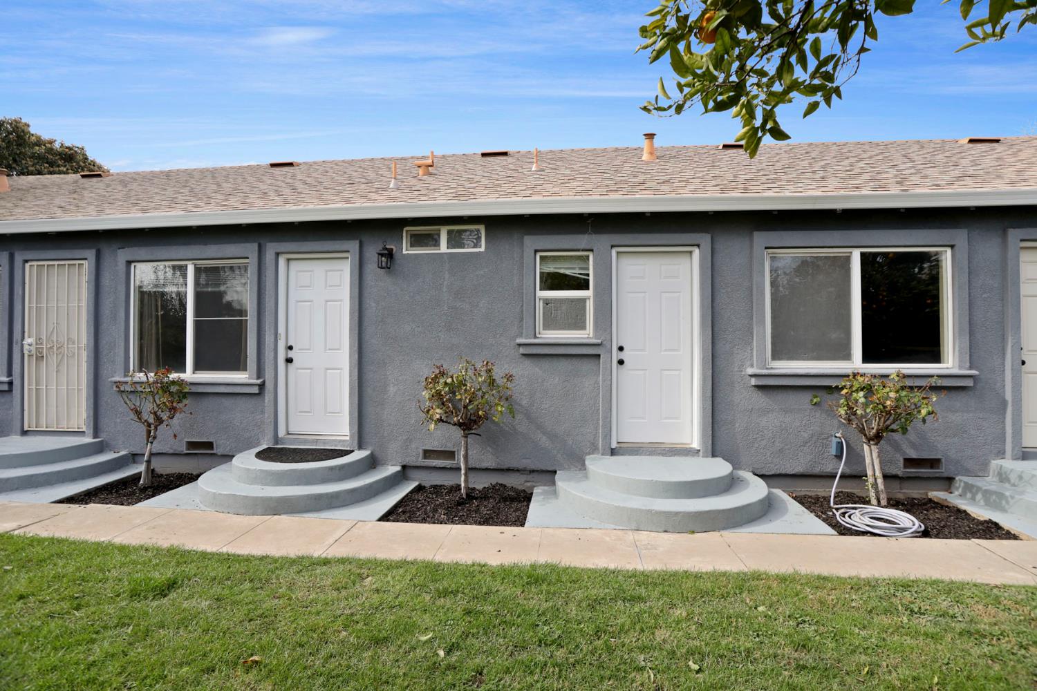 312 Cherry Street Lodi, CA 95240 - Photo 7 of 10 a front view of a house with garden