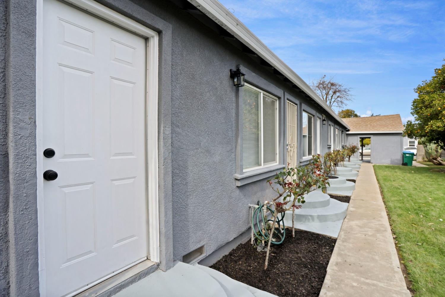 312 Cherry Street Lodi, CA 95240 - Photo 10 of 10 a front view of a house with garden