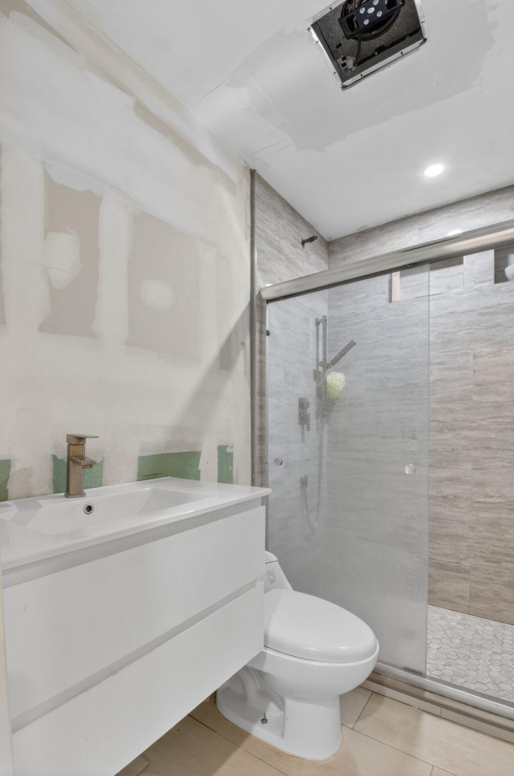 5196 Palm Ridge Boulevard Delray Beach, FL 33484 - Photo 12 of 24 a bathroom with a sink toilet and shower