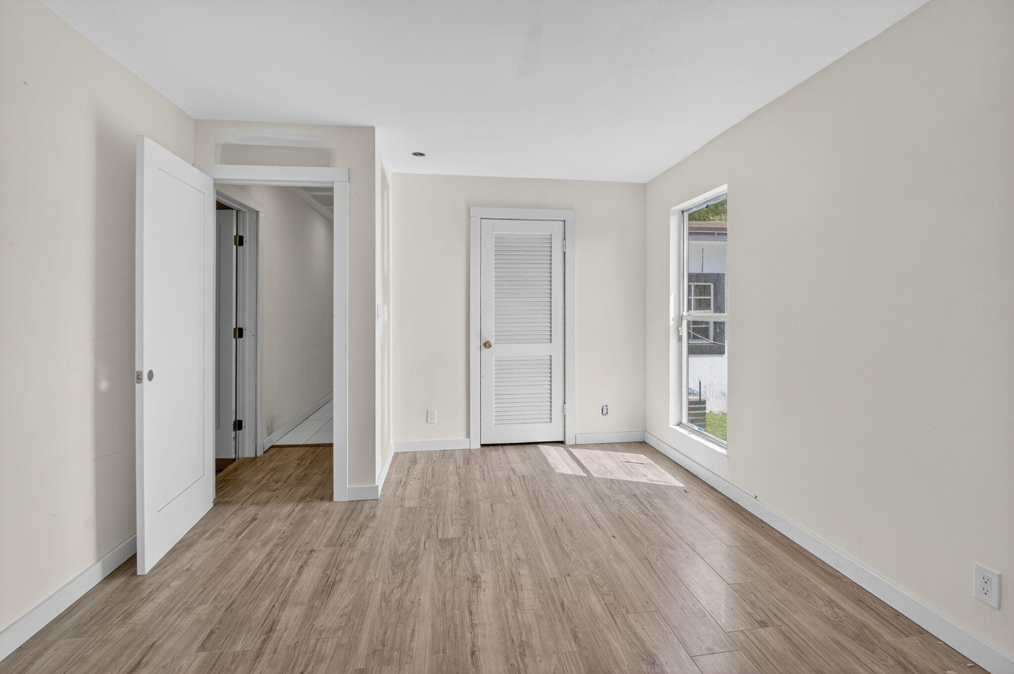 5196 Palm Ridge Boulevard Delray Beach, FL 33484 - Photo 13 of 24 wooden floor in an empty room
