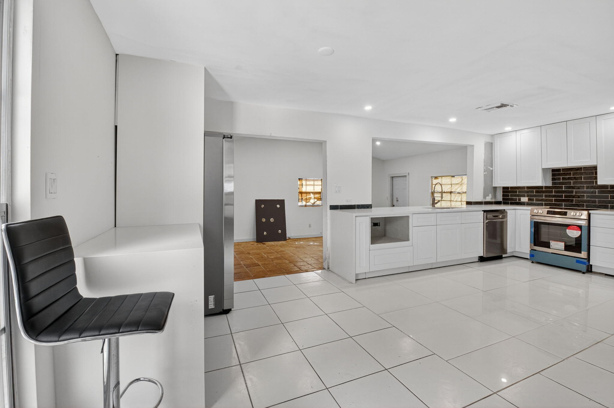 5196 Palm Ridge Boulevard Delray Beach, FL 33484 - Photo 21 of 24 a view of kitchen with furniture and refrigerator