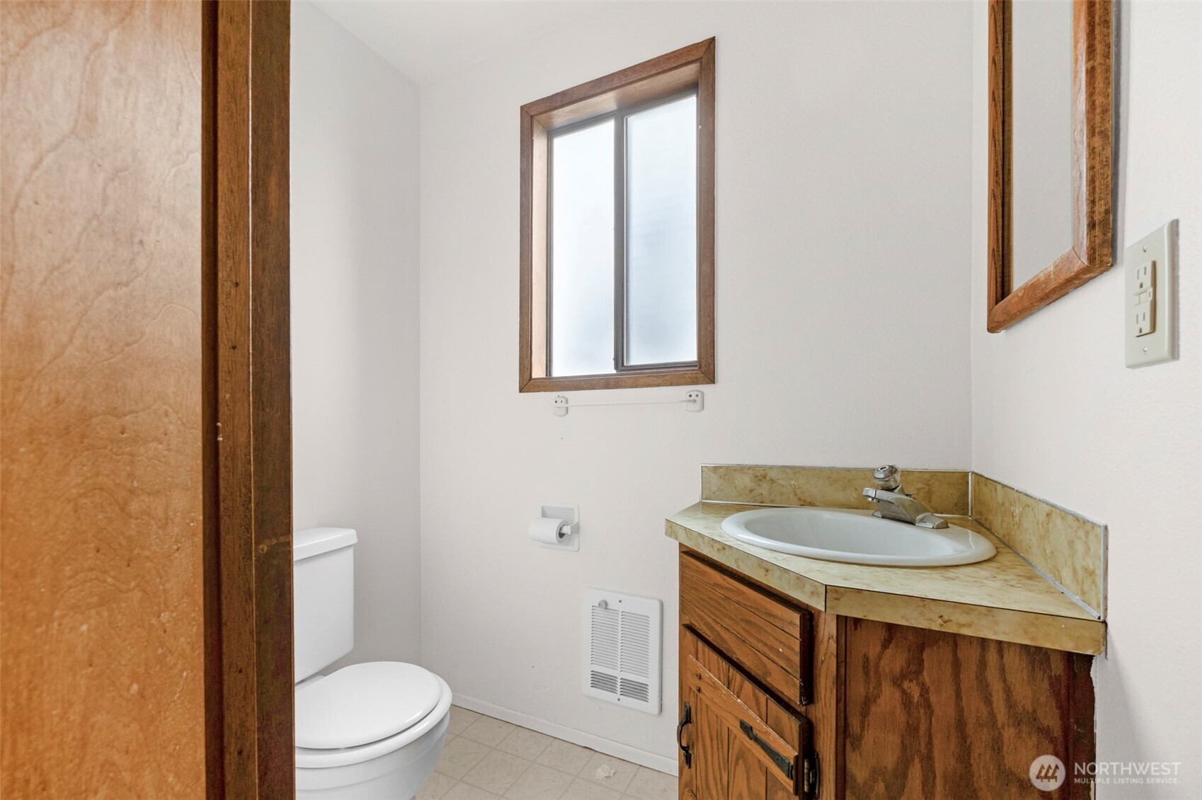 6920 Armar Road Marysville, WA 98270 - Photo 13 of 24 a bathroom with a sink toilet and vanity